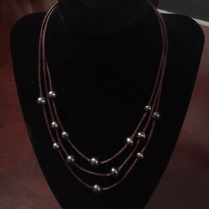 Leather and “pearl” necklace